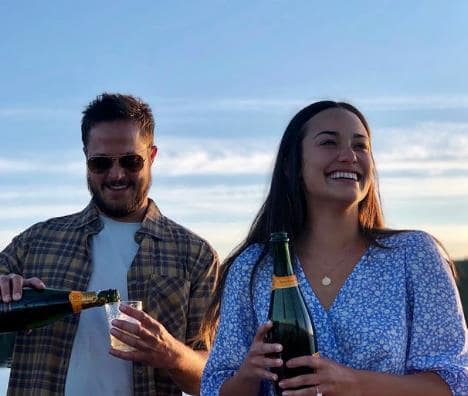 Alexandra Rodriguez enjoying with her wine bottles