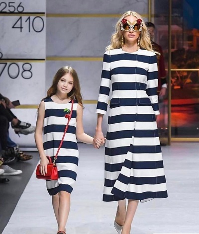 Zhenya Kotova doing ramp walk with her mother